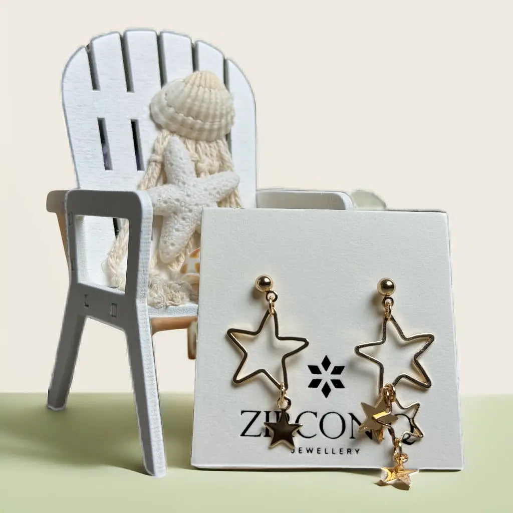 Gold Star Dangle Earrings
